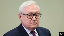 FILE - Russian Deputy Foreign Minister Sergei Ryabkov attends a meeting with Russian President Vladimir Putin at the Novo-Ogaryovo State residence outside Moscow in Moscow, Oct. 16, 2023.